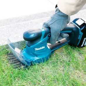 Makita 2-I-1 l�sning: Gr�s- & H�kkeklipper